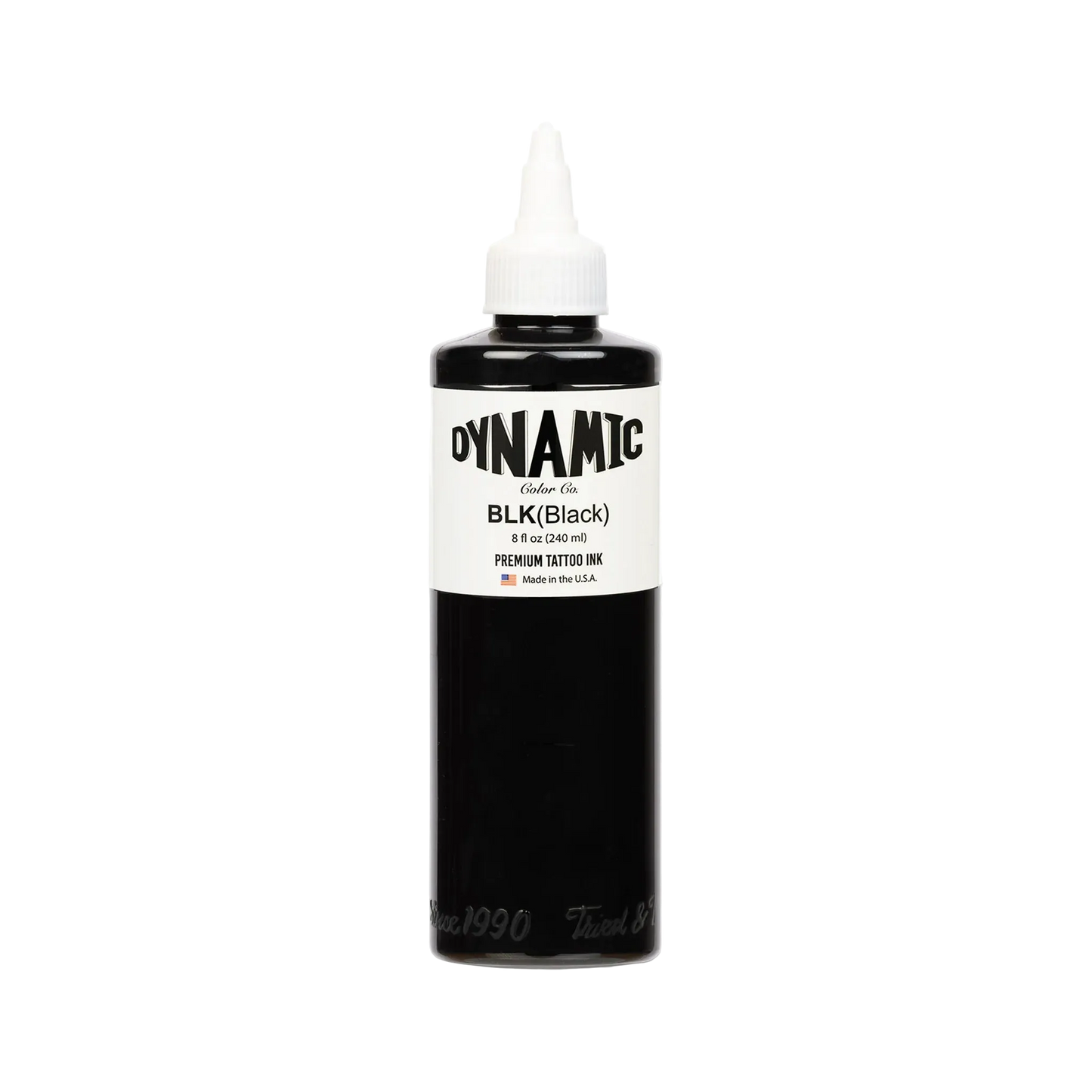 Bottle of Dynamic Black tattoo ink on a white background