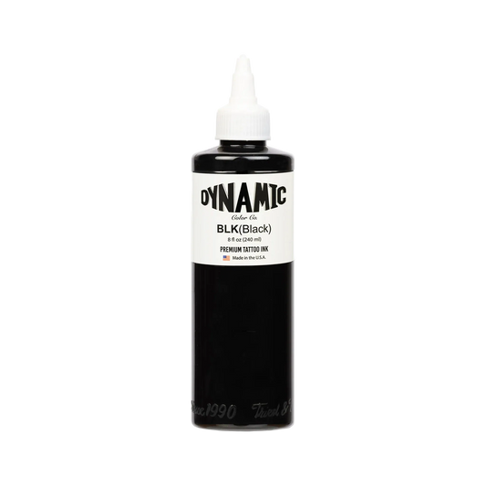 Bottle of Dynamic Black tattoo ink on a white background