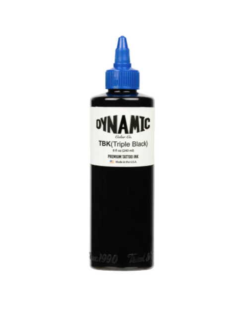 Bottle of Dynamic Tattoo Ink with blue cap on a white background