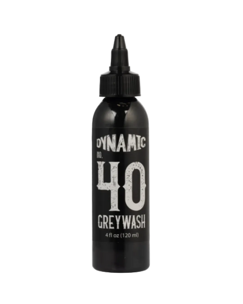 A black bottle labeled 'DYNAMIC 40 GREY WASH' with a dispensing tip, intended for tattooing.