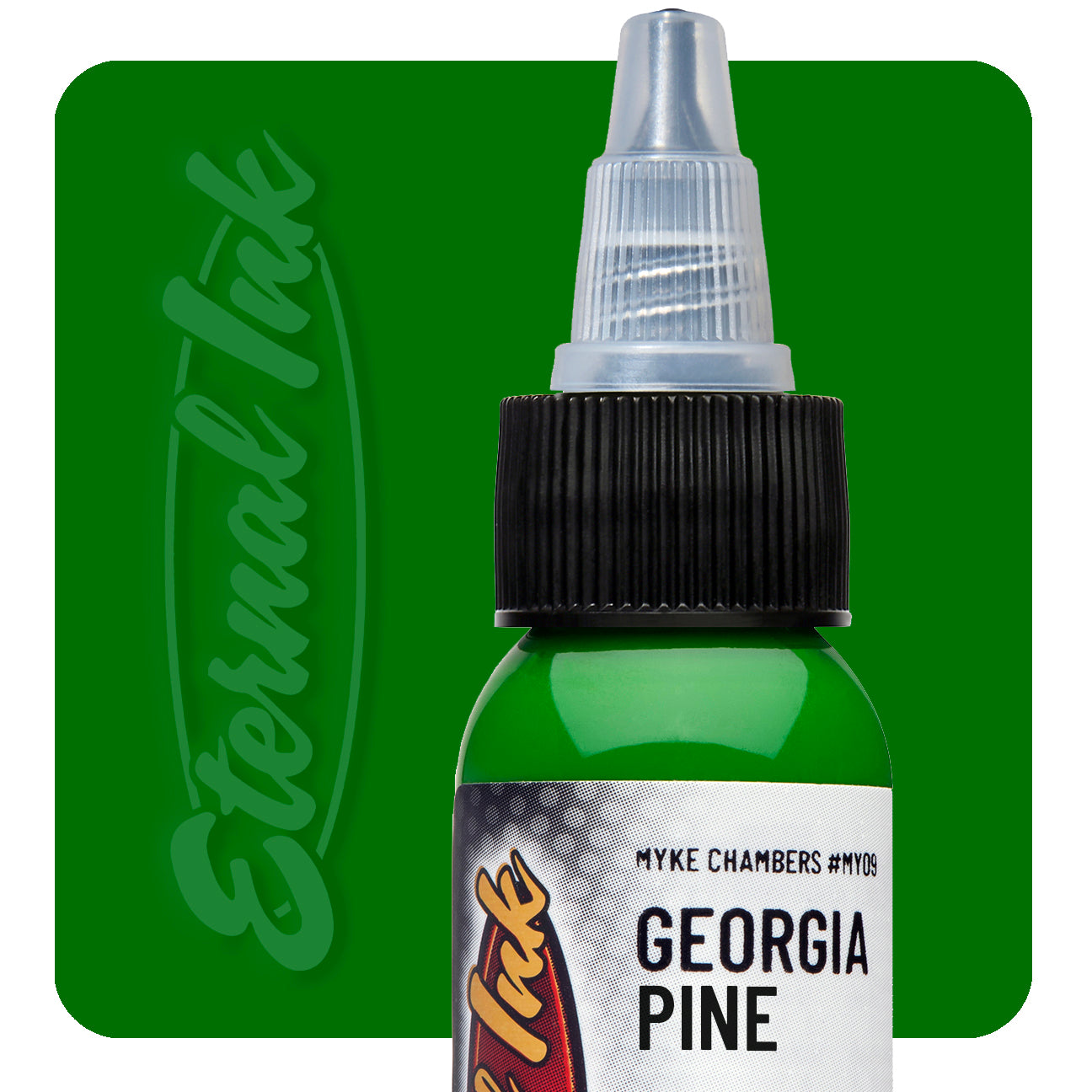 Bottle of tattoo ink labeled 'Georgia Pine' with 'Eternal Ink' branding on a green background.