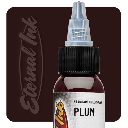 Bottle of plum tattoo ink with 'Eternal Ink' branding on a dark brown background