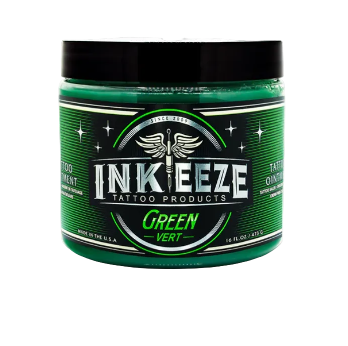 A container of Inkeeze tattoo products, specifically GREEN Glide, which is intended for tattooed skin care.