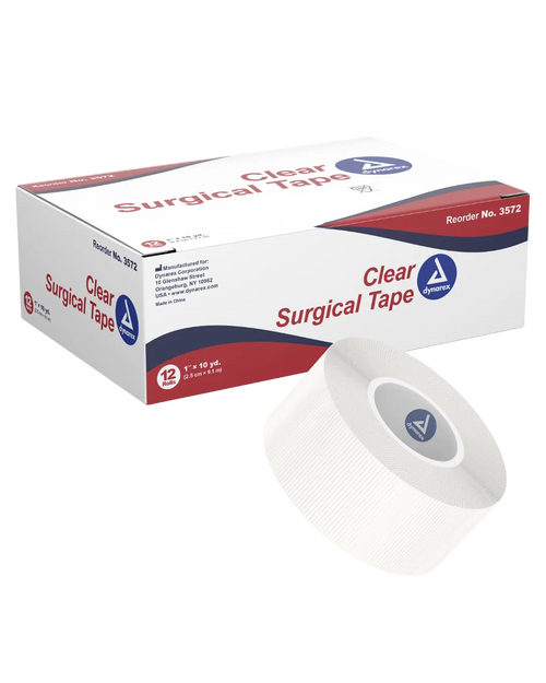 A box of clear plastic surgical tape with a roll partially unwrapped in front of the box. The box is labeled with the product name and quantity.