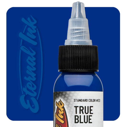 Bottle of Eternal Ink True Blue tattoo ink on a blue background
